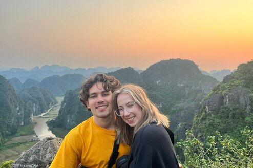 A couple atop a mountain in Ninh Binh, Vietnam